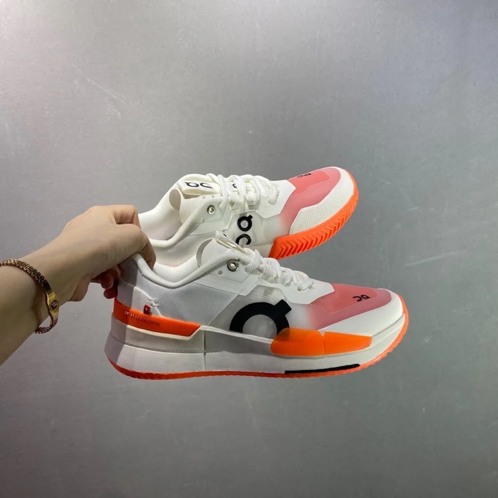 On Running Women's Sneakers in White and Orange - Picture 5 of 6